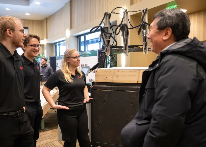 Members of the sheet rock project at the Senior Design Expo.