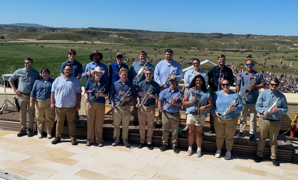 A group of NDSU music students and faculty posing for a photo at the Theodore Roosevelt Presidential Library grand opening on July 4.