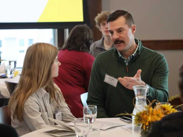 Business Connections pair talking.