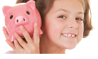 pink piggy bank and smiling little girl
