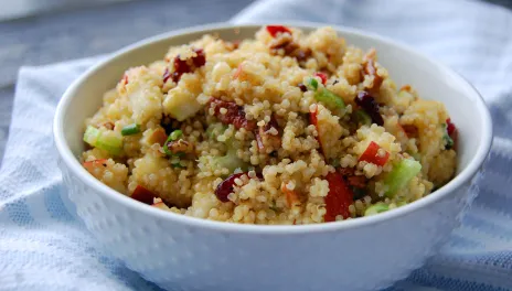 Apple Cranberry Quinoa Salad, prepared and in a white bowl