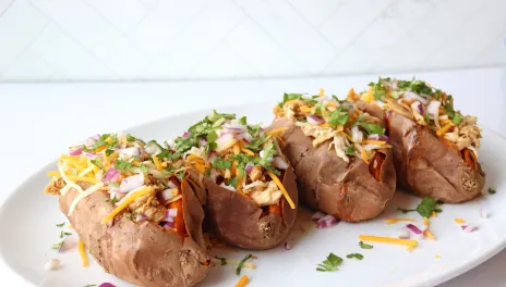 Four BBQ Chicken Sweet Potatoes on a plate