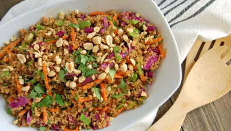 Thai Peanut and Cilantro Quinoa Salad, prepared and in a white ceramic dish