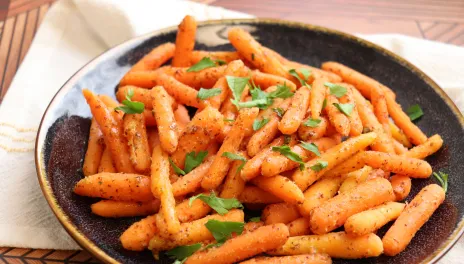 plate of carrots garnished with parsley