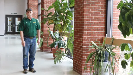 Albert "Jody" Vander Wal stainding in Loftsgard Hall