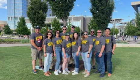 Group of people standing on grass