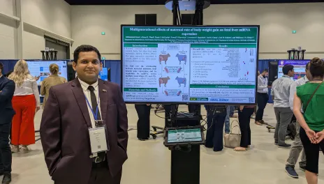 Graduate Student Muhammad Ana presenting poster