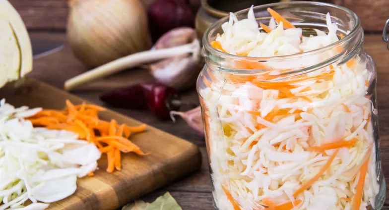 jar of cabbage and carrots ready to ferment