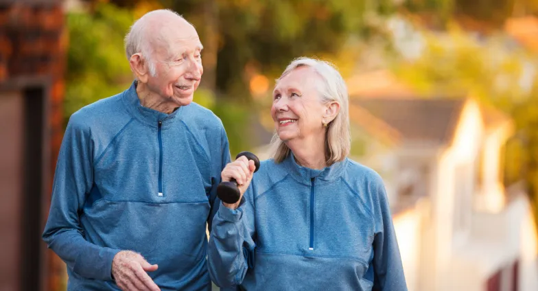 older couple exercising outside