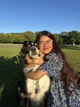 Photo of Teala Matiur and a dog