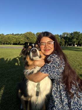 Photo of Teala Matiur and a dog