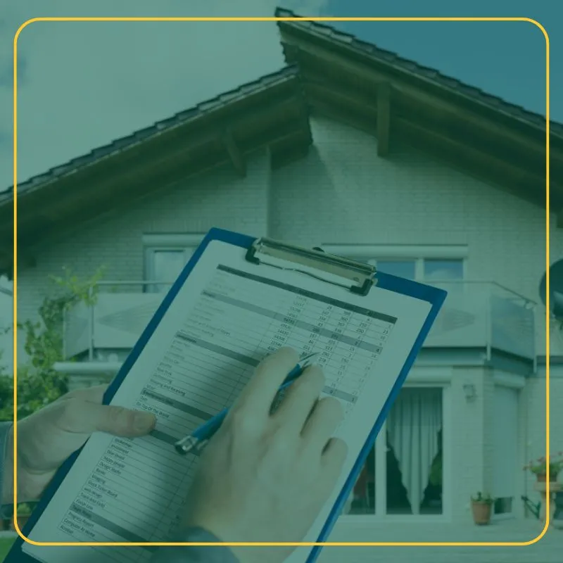 Person with a checklist on a clipboard in front of a house