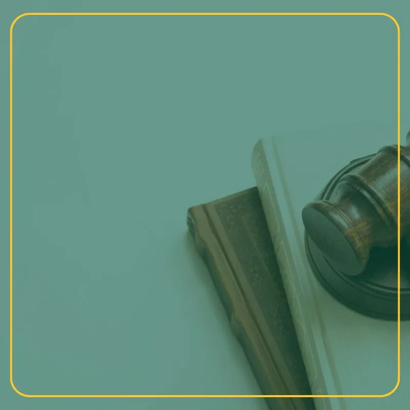 Gavel sitting on two law books
