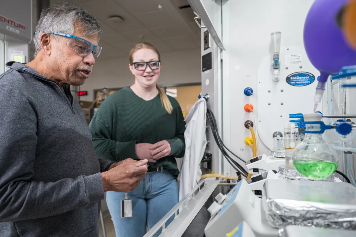 NDSU professor Mukund Sibi works with a Chemistry student